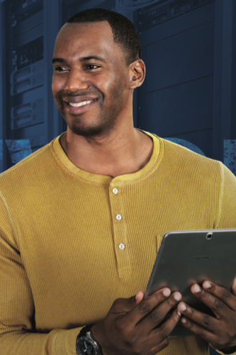 College student smiling with tablet device in hand