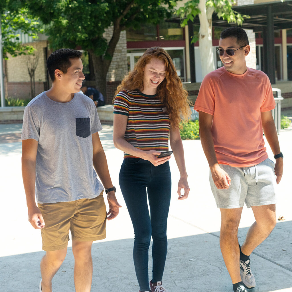 college students walk on campus
